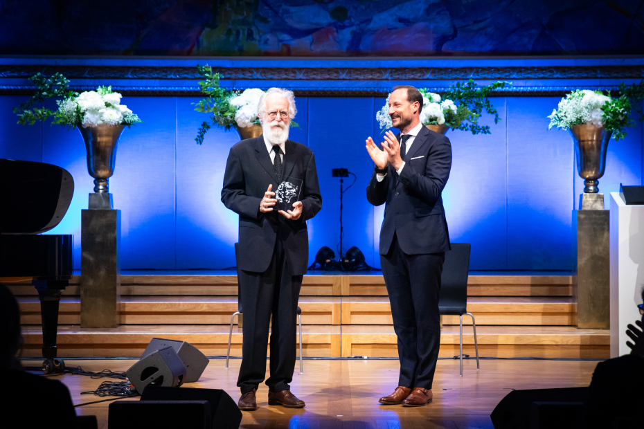 Michel Talagrand og H.K.H. Kronprins Haakon på scenen i Universitetets aula.